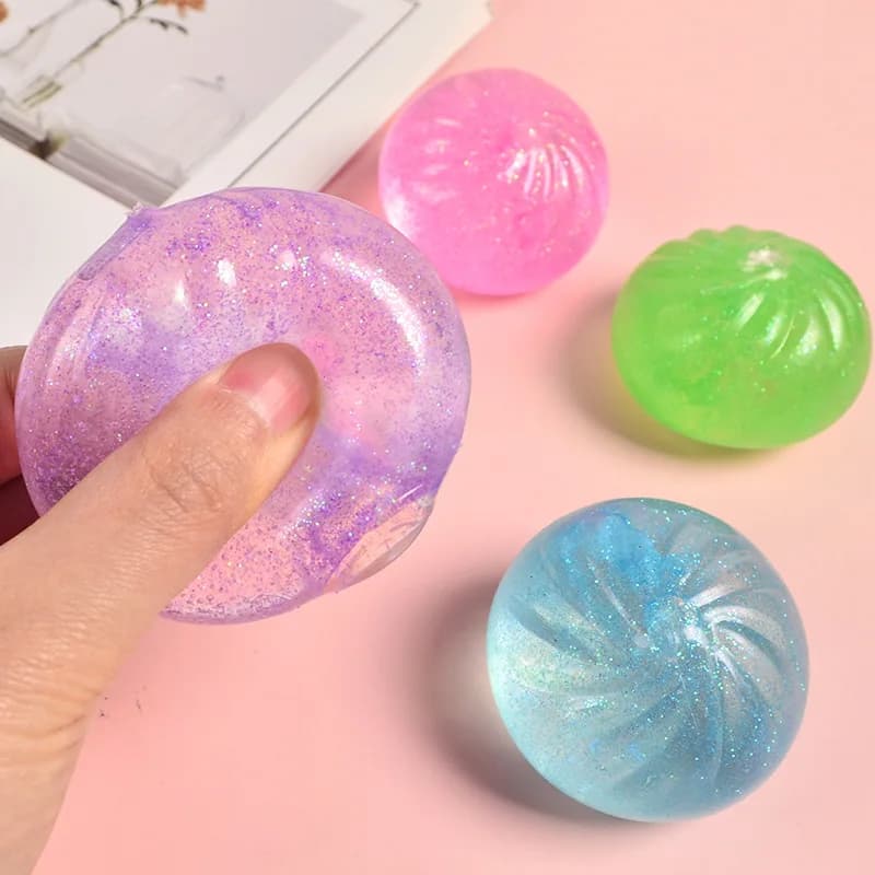 Mini gniotek „pieróg” – realistyczna bułeczka, sensoryczna zabawka typu fidget z kolorowym brokatem, antystresowa kulka w formie bułki na parze, mała zabawka do ściskania.